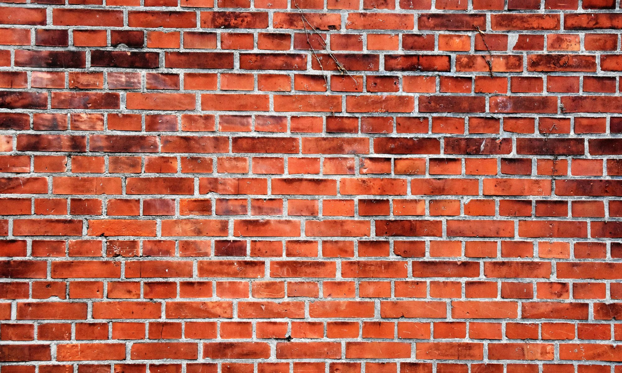 A reddish brick wall