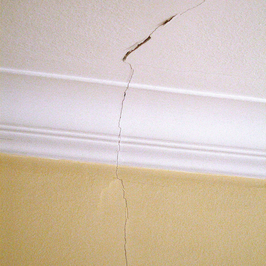 A ceiling to wall crack.